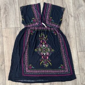 Kiwi Black Garment with‎ Pink and Yellow Accents